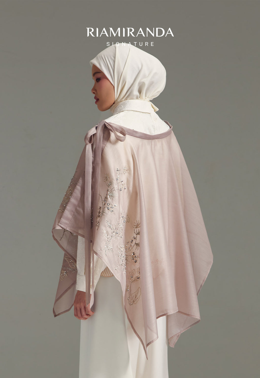 FLO CAPE EXTENDER