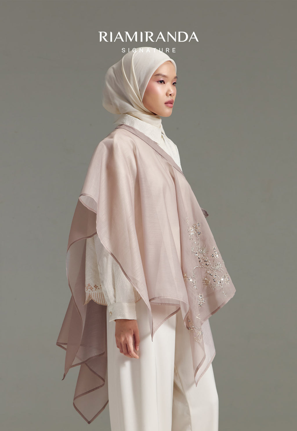 FLO CAPE EXTENDER